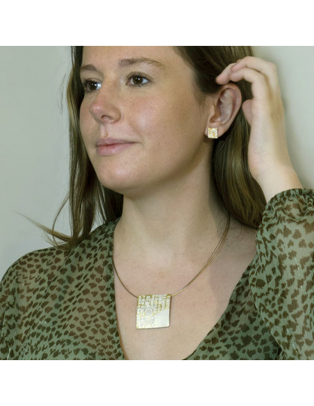 Colgante de plata con relieves en Oro Colección Veltha